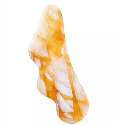 Gua Sha de fluorita groga per a massatge facial